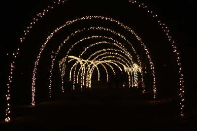 A trail being lit up by decroative arches